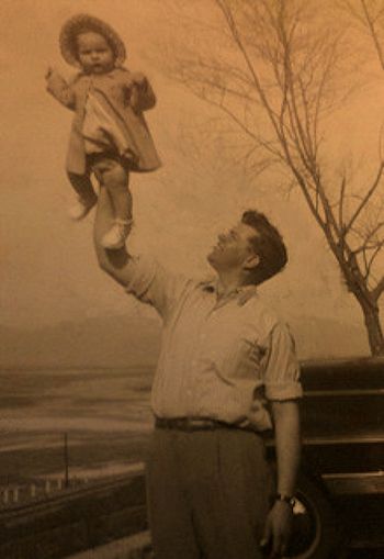 Dad shows off his little girl, Sheri