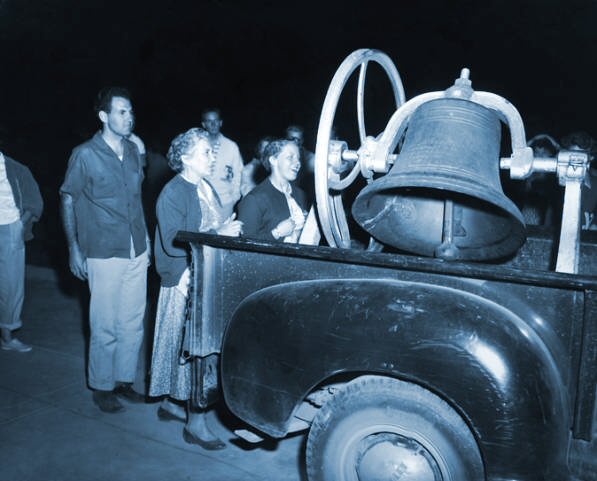 BYU graduating seniors ring Y Bell in 1950s